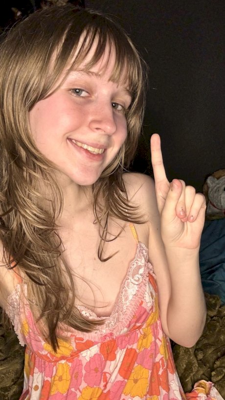 Sexy amateur teen Teensy Bella poses seductively in her nightgown