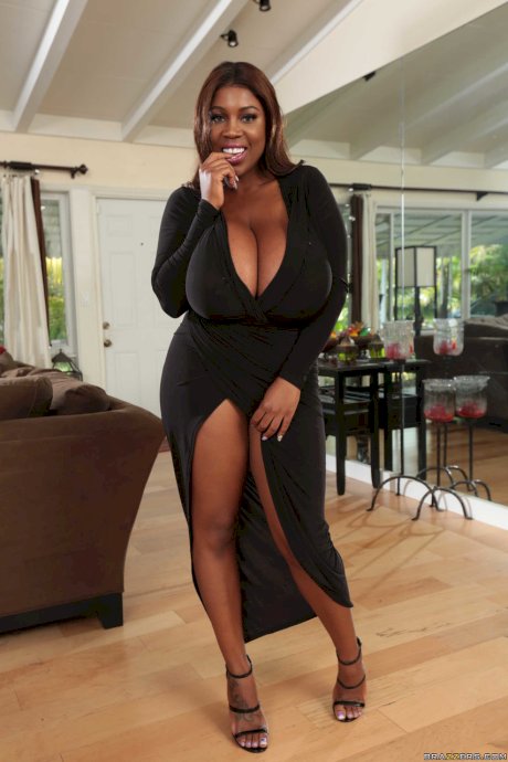 Buxom ebony with huge breasts Maserati reveals her sexy curves in a solo