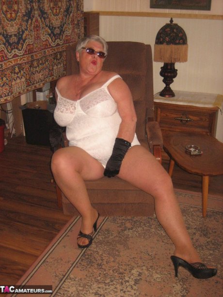 Fat granny Girdle Goddess gets naked in shades, gloves and pantyhose