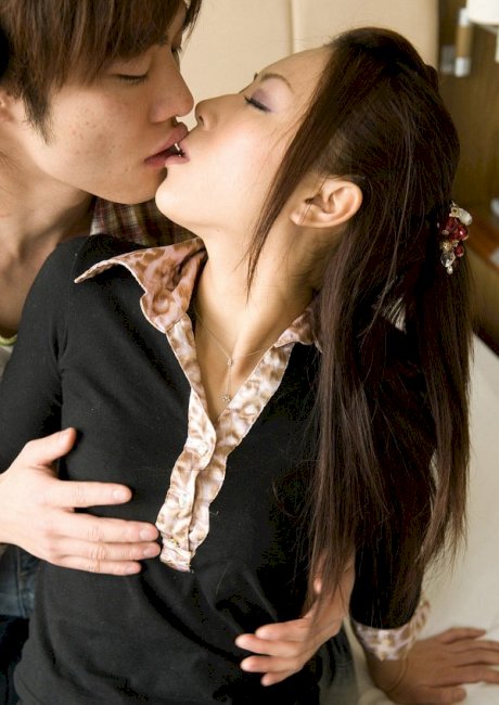 Sweet Japanese teen Rimu gets topless in mesh stockings and sexy panties