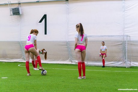 Skinny teen soccer players undressing and rubbing each other's muffs