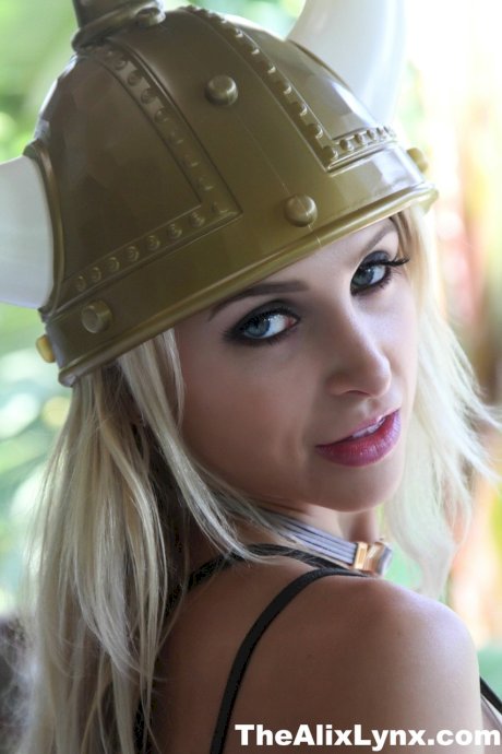Blonde chick Alix Lynx unleashes her big tits attired in a Viking outfit