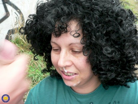 Curly-haired amateur prostitute with big tits Johanna sucks 2 dicks in public - Photo 15