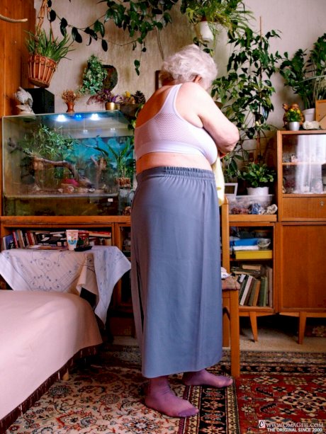 Fat old granny Galfira undresses and poses naked in a solo show
