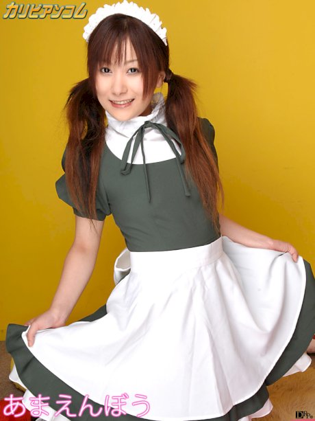 Young Asian broad Miku Haruno gives a sneak peek at her small tits and poses