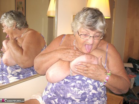 Fat British nan Grandma Libby completely disrobes while in a hotel room