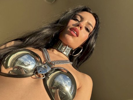 Hot brunette Kore Fox models fetish wear during a solo engagement - Photo 11