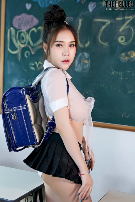 Hot Japanese student Parissa strips to her black boots in a classroom