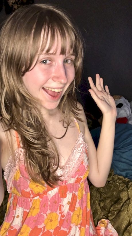 Sexy amateur teen Teensy Bella poses seductively in her nightgown