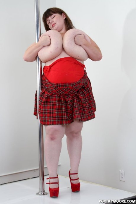 SSBBW Lexxxi Lux gets naked on a stripper platform after a POV blowjob - Photo 12