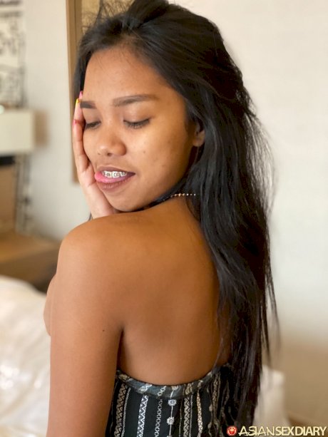 Asian babe Fon B flaunts her small tits while stripping for some POV sex porn pics