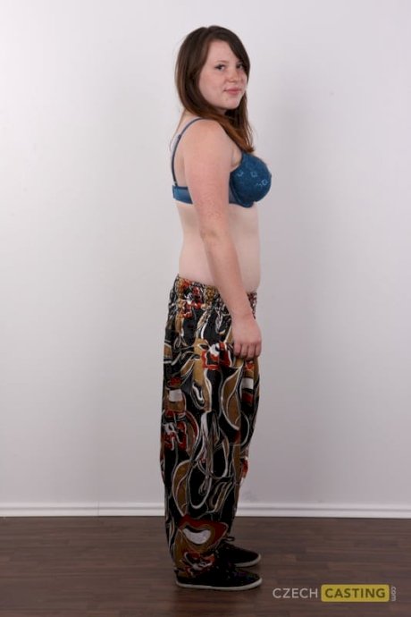 Chubby redhead undresses to stand naked and show her big tits and big butt - Photo 5