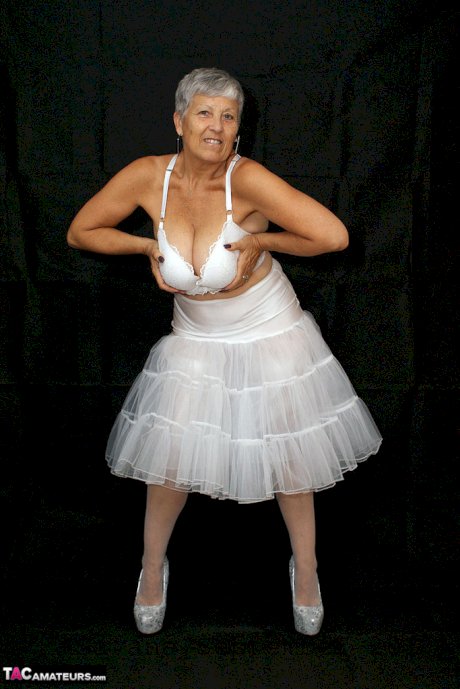 Brazen plump granny Savana flashes panty upskirt in tutu & sparkly high heels