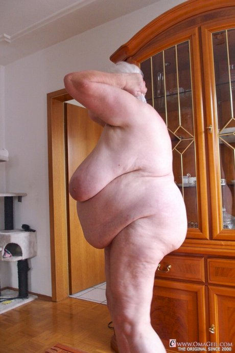 Naughty granny Neebana shows her chubby body while completely naked