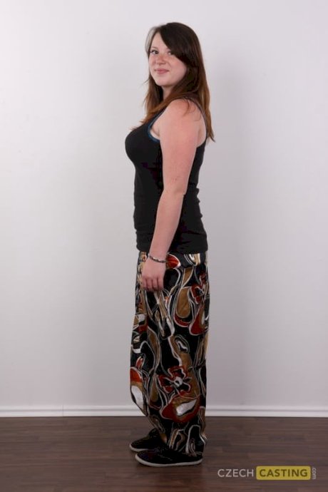Chubby redhead undresses to stand naked and show her big tits and big butt - Photo 3