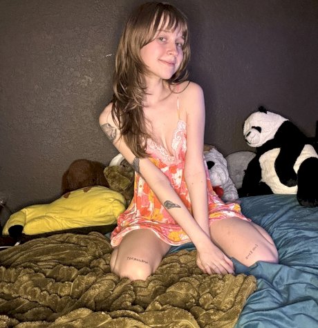 Sexy amateur teen Teensy Bella poses seductively in her nightgown