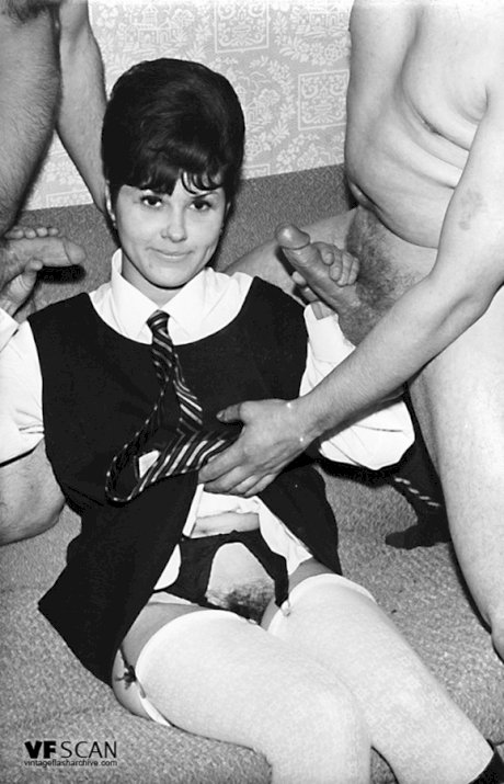 Small titted vintage schoolgirl removes her uniform for a big cock threesome