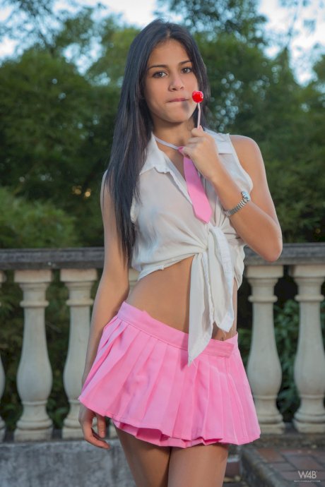 Venezuelan teen with a hot ass Denisse Gomez strips and poses on the terrace